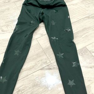 Olive green workout pants with stars
